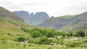 An extensive camp site before the well treed cottage area.